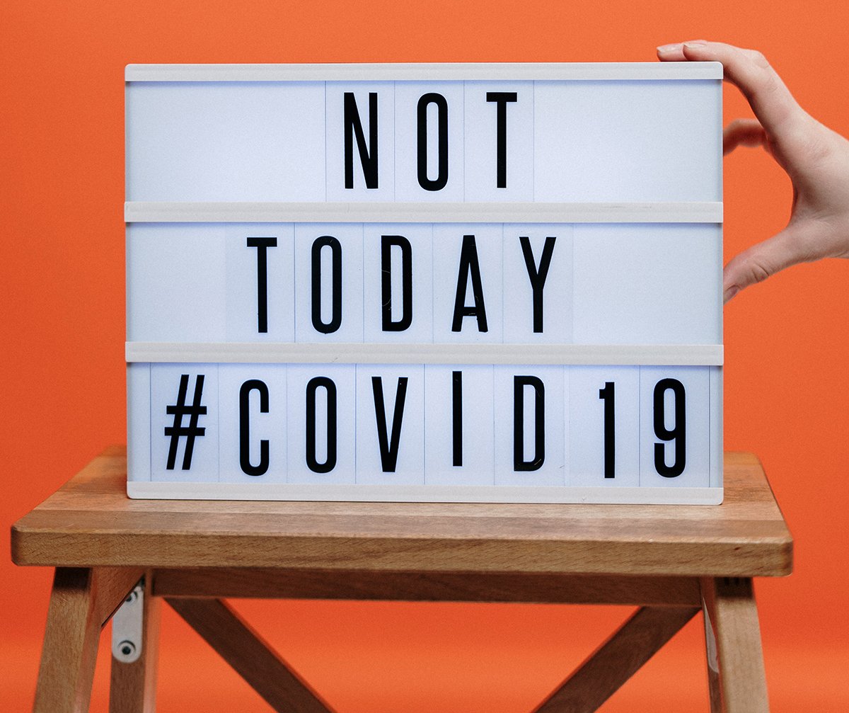 not-today-covid19-sign-on-wooden-stool-3952231